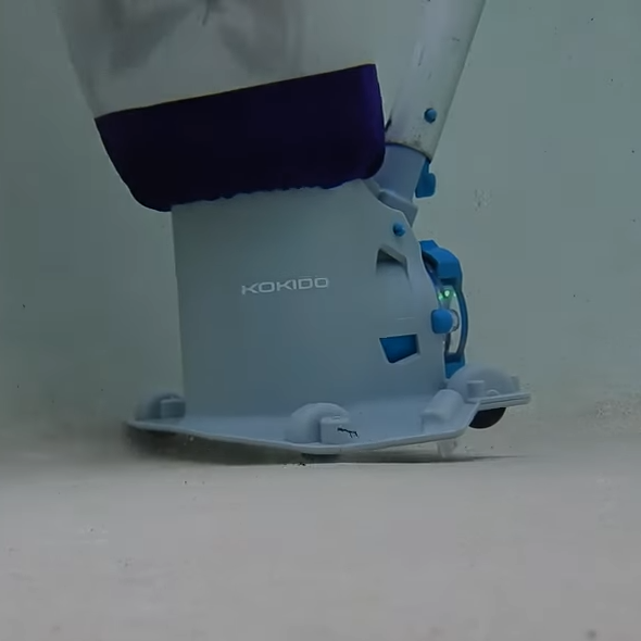 Clear Pool 45 Micron Amethyst Micro Bag attached to Kokido handheld pool vacuum on pool floor