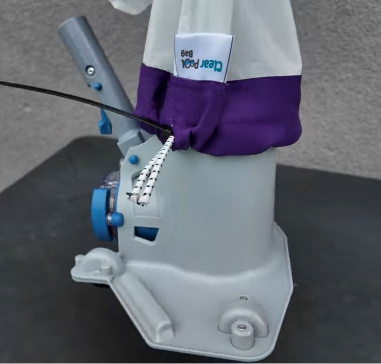 Clear Pool 45 Micron Amethyst Micro Bag supporting pool vacuum showing purple collar and white mesh filter bag